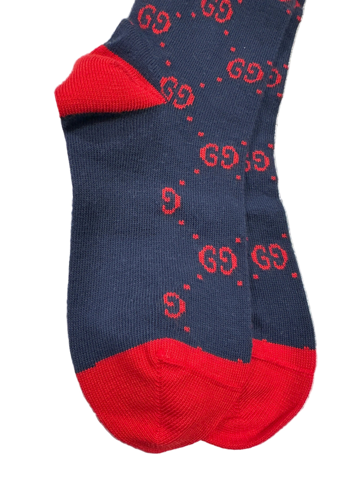 Gucci Designer-Kindersocken in Dunkelblau/Rot, Detailansicht mit roten Spitzen und roter Ferse